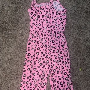 Girls  romper. Size large 10/12. Never worn.